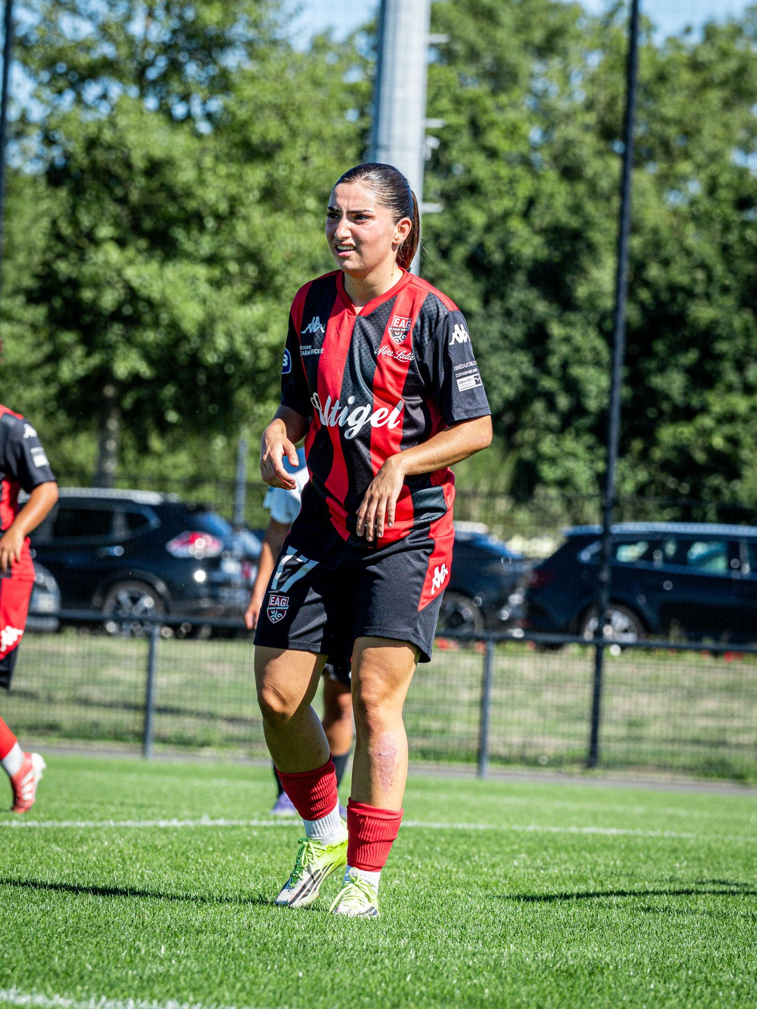Joueuse de l’En Avant Guingamp sur le terrain, photographie Amy Pulse